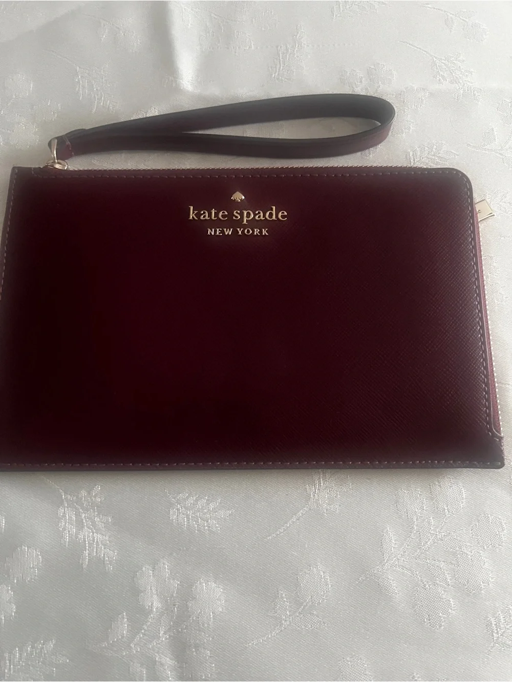 kate spade New York Deep Wine Leather Wristlet